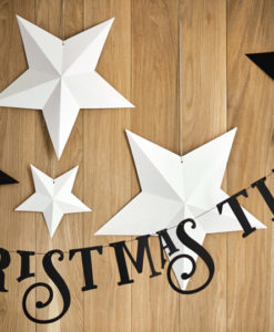 Kerstbanner met witte en zwarte sterren